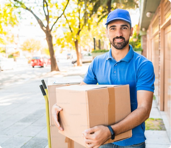 A delivery man holding a parcel